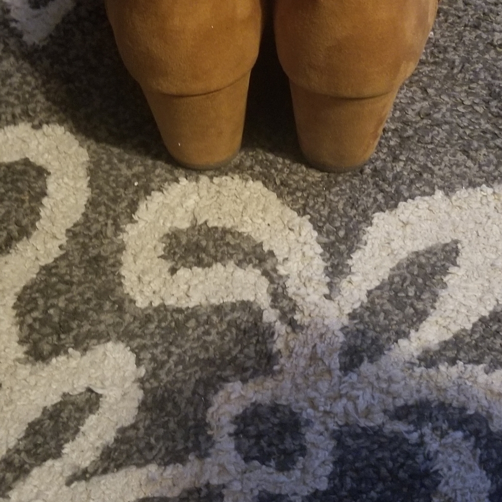 Carmel color booties in very good condition great for fall season.